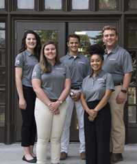 A group of Herbert College of Agriculture Ambassadors pose in front of Morgan Hall