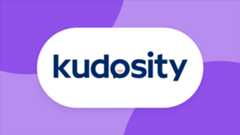 Group of three women at an event, featuring "Kudosity" branding in a lively event setting.