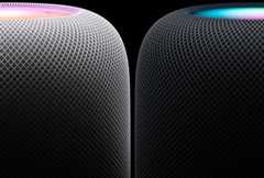 One White, and one Midnight HomePod pictured side-by-side