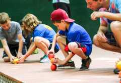 Campers stacking apples for the camp olympics