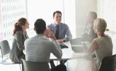 Team meeting talking about BOQ's history