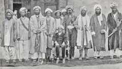 Chitralis held in Chitral Fort during the siege; Shuja-ul-Mulk, Mehtar of Chitral sits in front: Siege and Relief of Chitral, 3rd March to 20th April 1895 on the North-West Frontier of India