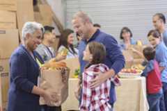 Photo: Poverty - People picking up food at a food bank
