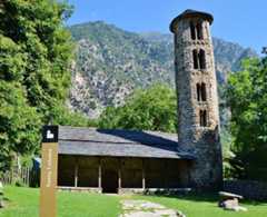 The Church of Santa Coloma d'Andorra, the oldest church in Andorra, is located in the Andorra la Vella Parish. It is dedicated to Columba of Sens, who is the patron saint of the country, and was built between the 8th and 9th centuries. The circular four-story bell tower was added during the 12th century. The church is featured on some Andorran euro coins.