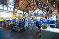 A view inside a general store with log walls and ceilings at Yellowstone National Park