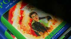 1000x564_famousbannedbooksarticle_102424 Close up shot of the book Harry Potter and the Half-Blood Prince.