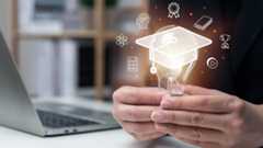 person holding lightbulb with icons surrounding lightbulb and laptop in background