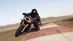 A rider on a Triumph Street Triple 765 RX