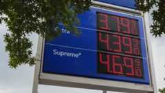 Gas prices listed on an Exxon gas station sign