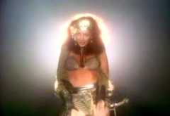 Still from the music video of 'Babooshka'