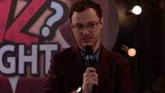 Griffin Newman as a quizmaster