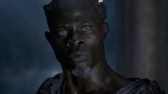 Korath the Pursuer glares with blue eyes