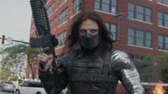 Winter Soldier with a gun in the street