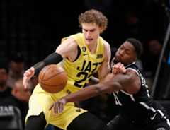 202304021854TMS_____MNGTRPUB_SPORTS-NETS-WIN-THIRD-STRAIGHT-WITH-VICTORY-1-NY5.jpg Utah Jazz forward Lauri Markkanen, left, and Brooklyn Nets forward Dorian Finney-Smith battle for the ball during the first half of an NBA basketball game Sunday, April 2, 2023, in New York. (AP Photo/John Munson) (John Munson, AP)