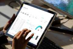 A person holding a tablet computer