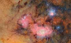 Combined images of clouds of gas and dust that comprise the Trifid nebula (top) and the Lagoon nebula, brown and pink features.