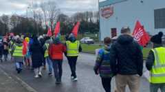 People hold a rally outside Carrolls cuisine in Offaly People hold a rally outside Carrolls cuisine in Offaly