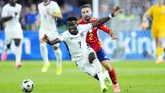 Bukayo Saka right winger of England and Arsenal FC competes for the ball with Daniel Carvajal right-back of Spain and Real Madrid during the UEFA EURO 2024 final match between Spain and England at Olympiastadion on July 14, 2024 in Berlin, Germany. Bukayo Saka right winger of England and Arsenal FC competes for the ball with Daniel Carvajal right-back of Spain and Real Madrid during the UEFA EURO 2024 final match between Spain and England at Olympiastadion on July 14, 2024 in Berlin, Germany.