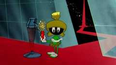 Marvin the Martian holding a sparkling stick of dynamite in Hare-Way to the Stars