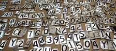 Cut-up car number plates