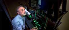 NIWA physicist Ben Liley adjusting a LIDAR