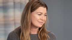 Meredith Grey wearing a grey sweater