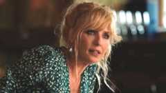 Beth Dutton hunched over on Yellowstone