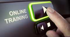 Finger pressing a push button to start playing a tutorial.