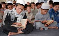 Schoolboys reading the Koran in Afghanistan