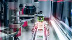 Machine Vision Camera imaging product on a conveyor belt. Machine Vision Camera imaging product on a conveyor belt.