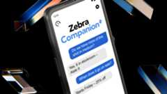 Worker in an industrial facility with a Zebra tablet. Worker in an industrial facility with a Zebra tablet.